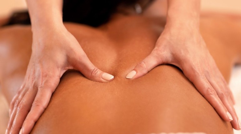 Photo of a woman receiving a massage