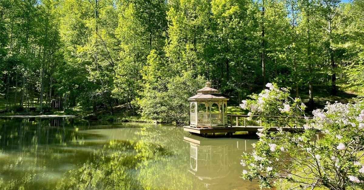 Photo of a gazebo on the pond at the Sanctuary