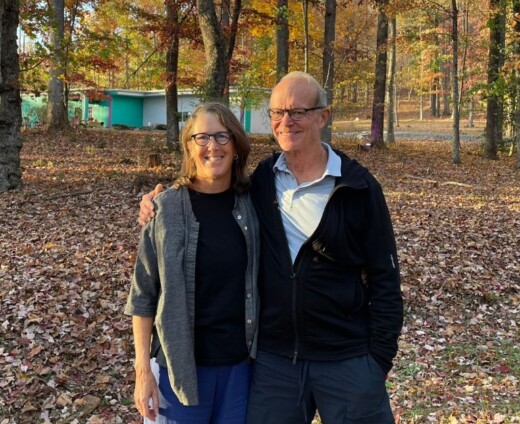 A photo of Philip Shepherd and Allyson Philips, leaders of The Embodied Present Process, outside of the Sanctuary's Learning and Multimedia Center.