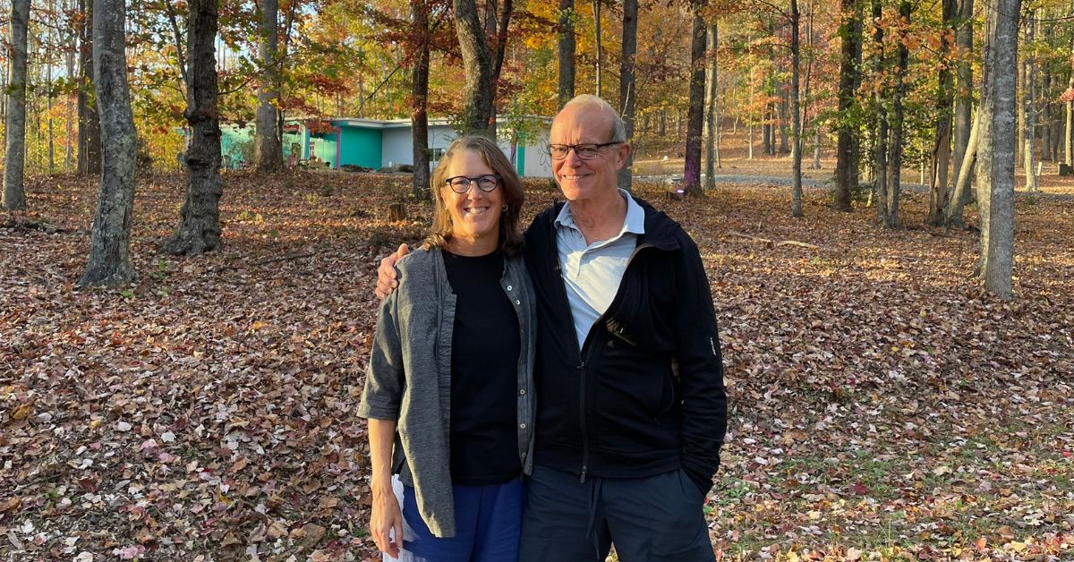 A photo of Philip Shepherd and Allyson Philips, leaders of The Embodied Present Process, outside of the Sanctuary's Learning and Multimedia Center.