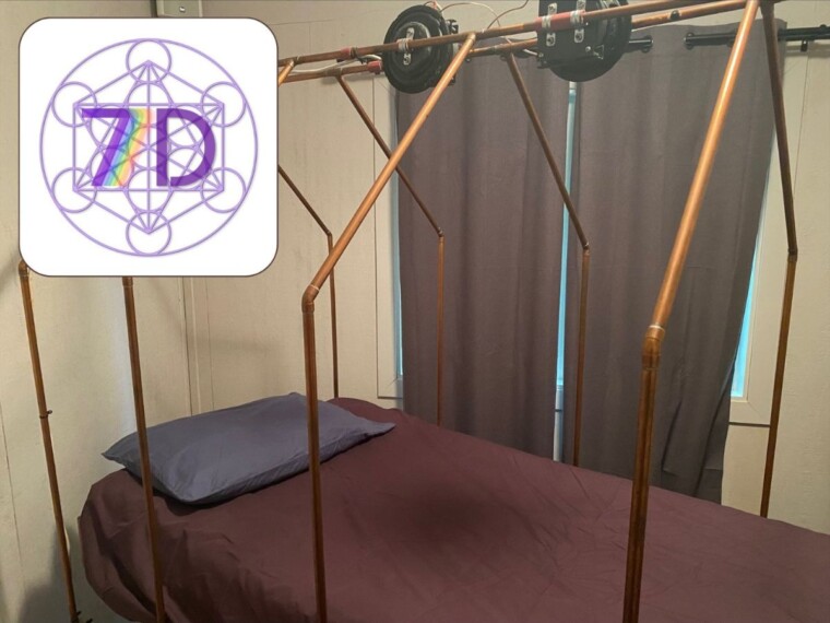 A picture of the setup for the 7D Immersion. There is a bed with a few small diameter copper tubes surrounding it.